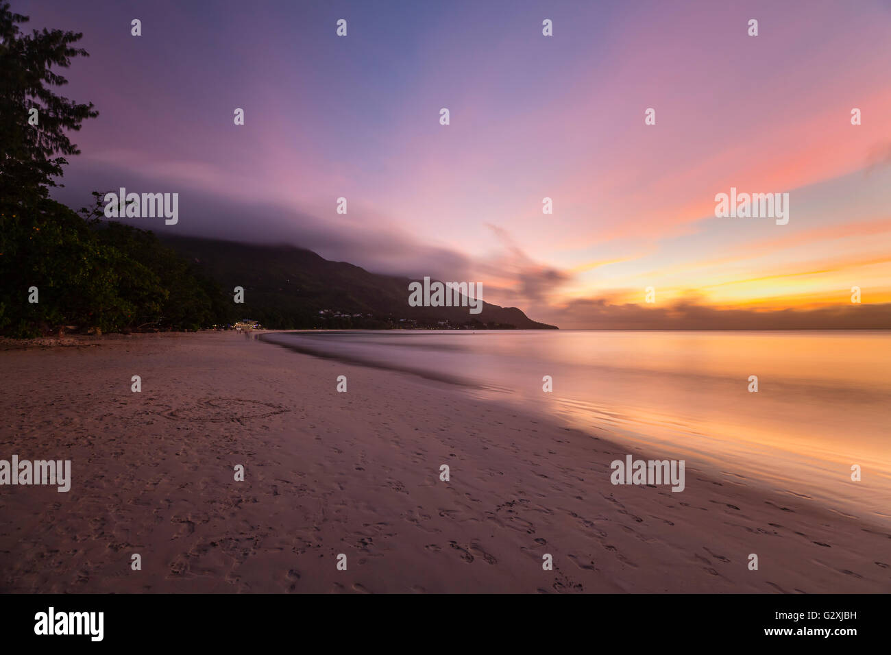 Beautiful beach sunset in Beau Vallon in Mahe, Seychelles Stock Photo