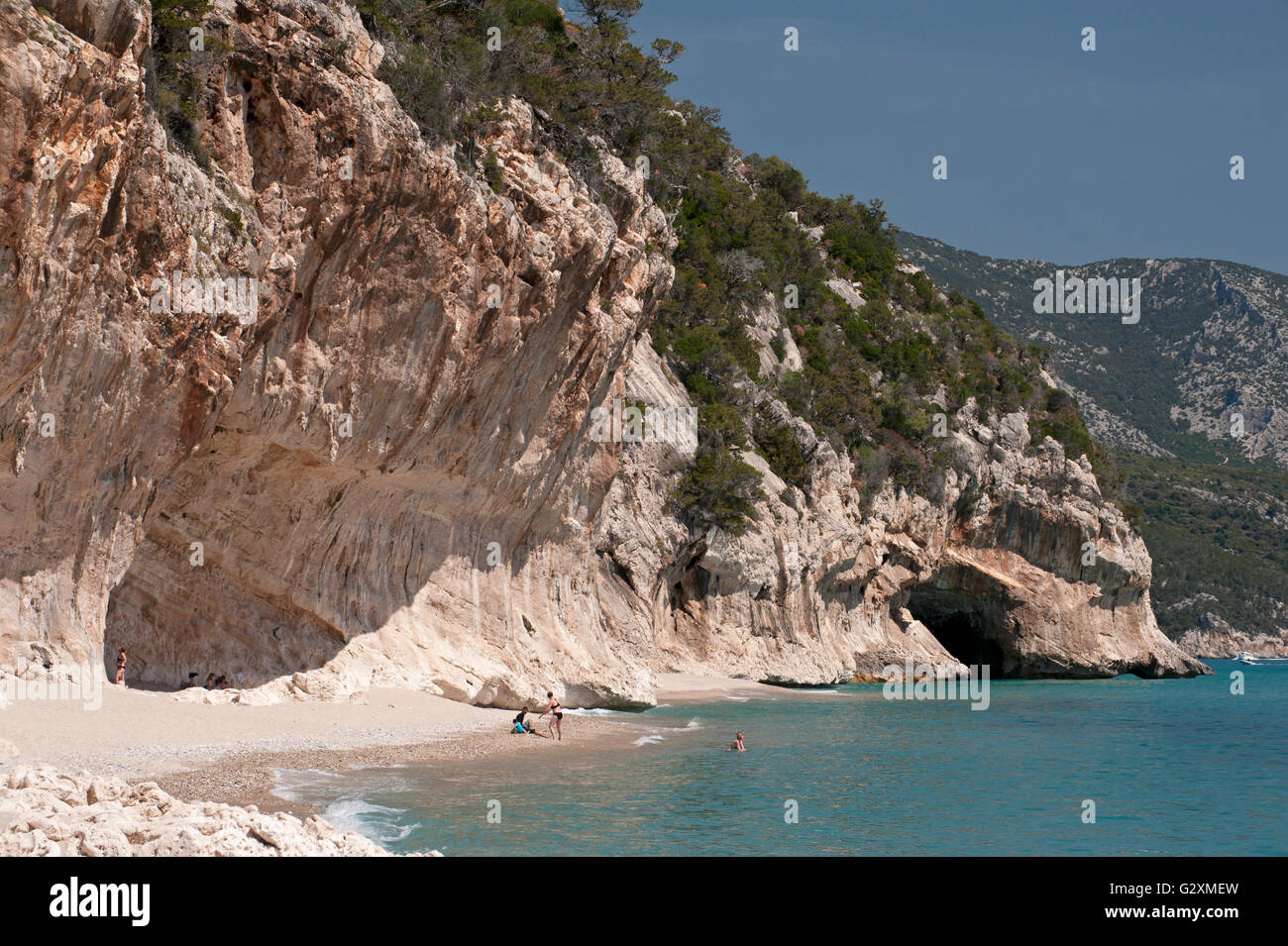 Cala Gonone,Dorgali,Sardinia,Italy, 25/5/2016.Cliffs and caves on the shore of the famous Cala Luna beach, Orosei gulf. Stock Photo