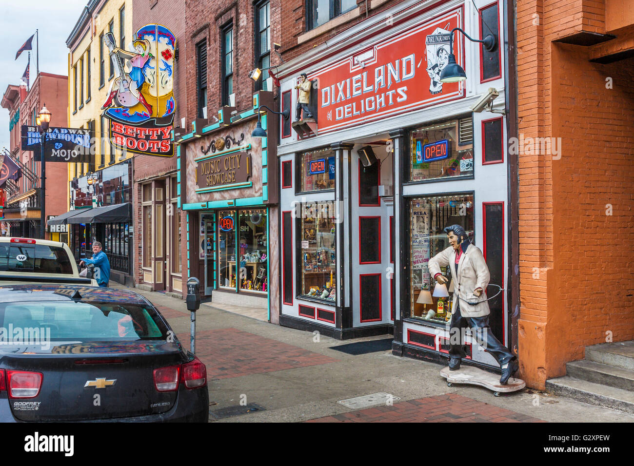 Statue of Elvis Presley on sidewalk outside of Dixieland Delights gift