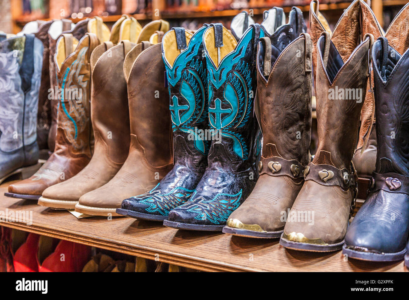 Large variety of cowboy boots for sale at boot store in downtown Nashville, Tennessee Stock Photo