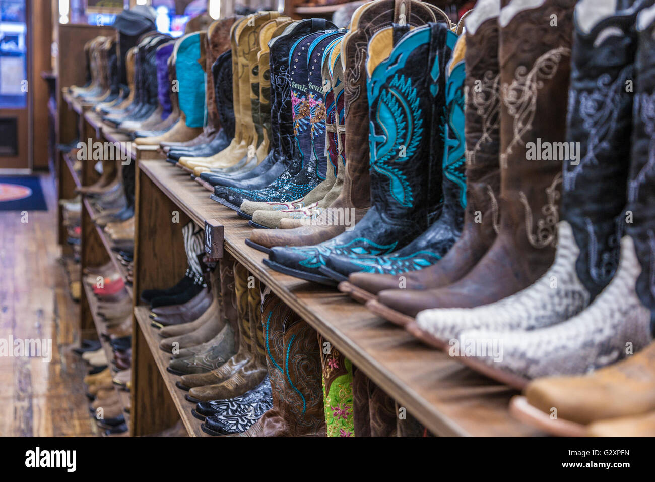 Large variety of cowboy boots for sale at boot store in downtown