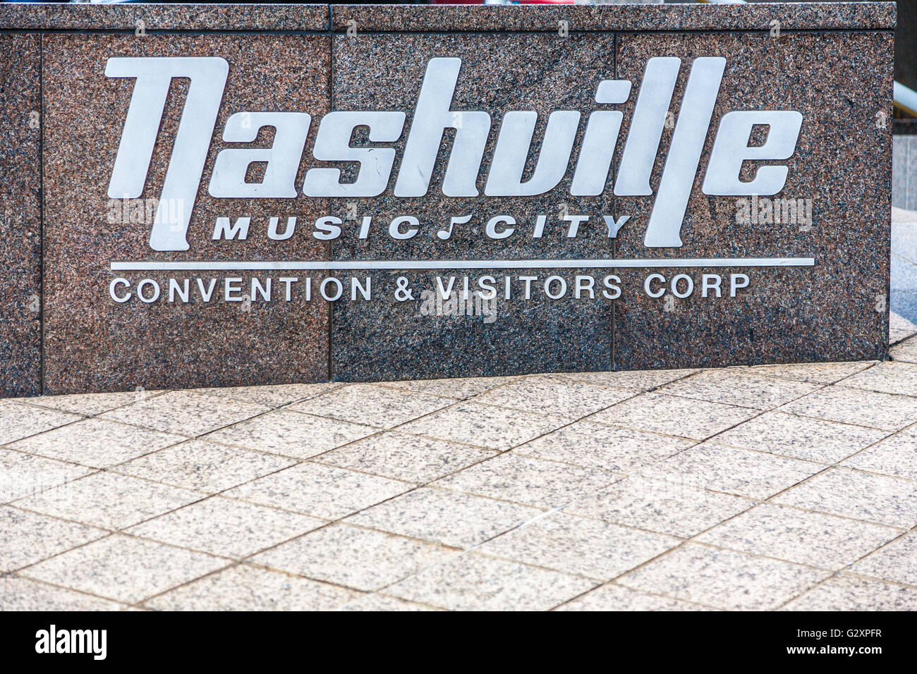 Sign on stone wall for the Nashville Music City Convention & Visitors Corp in downtown Nashville, Tennessee Stock Photo