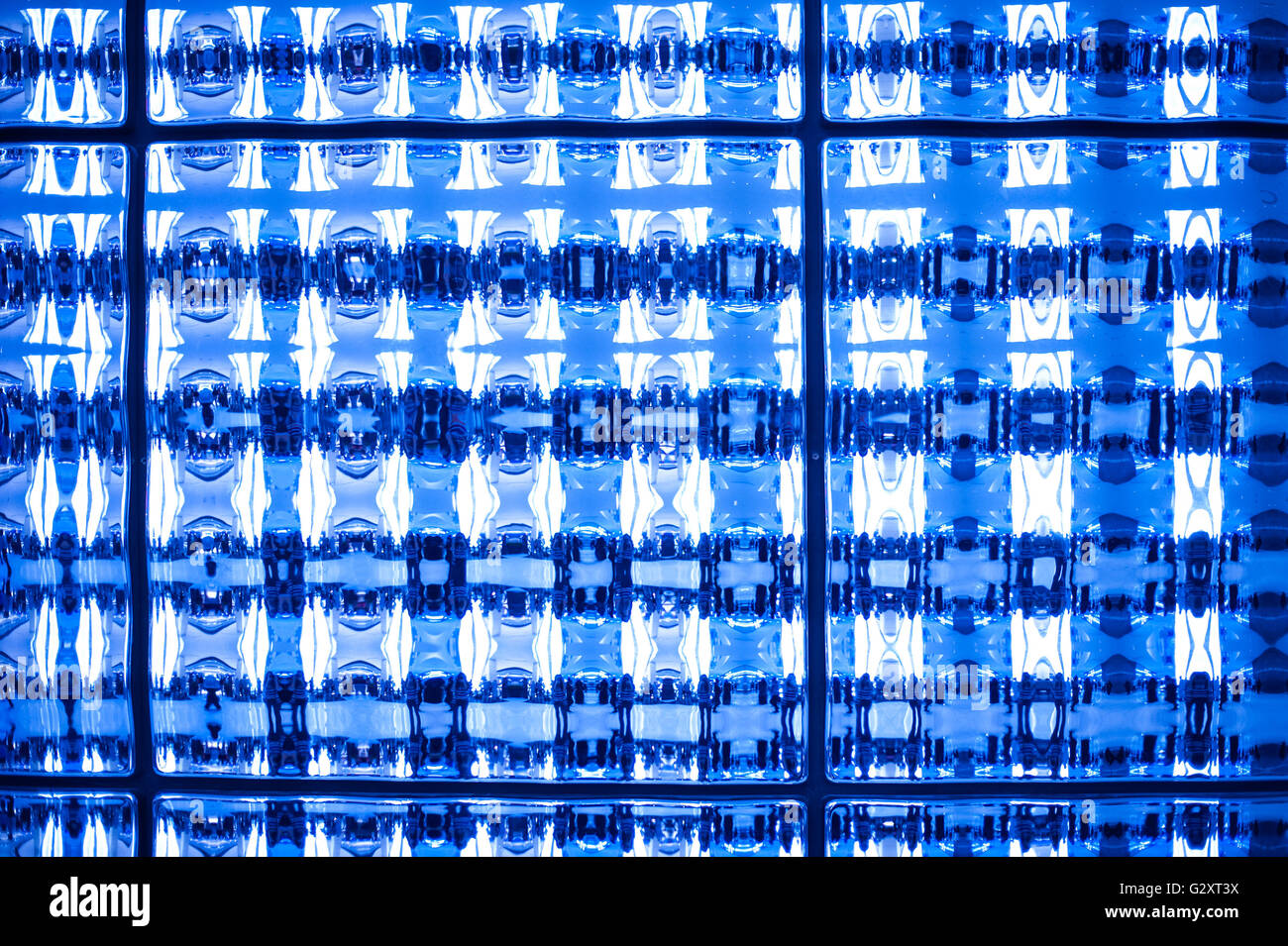 Abstract blue tone stained mosaic pixel texture wallpaper background Stock Photo