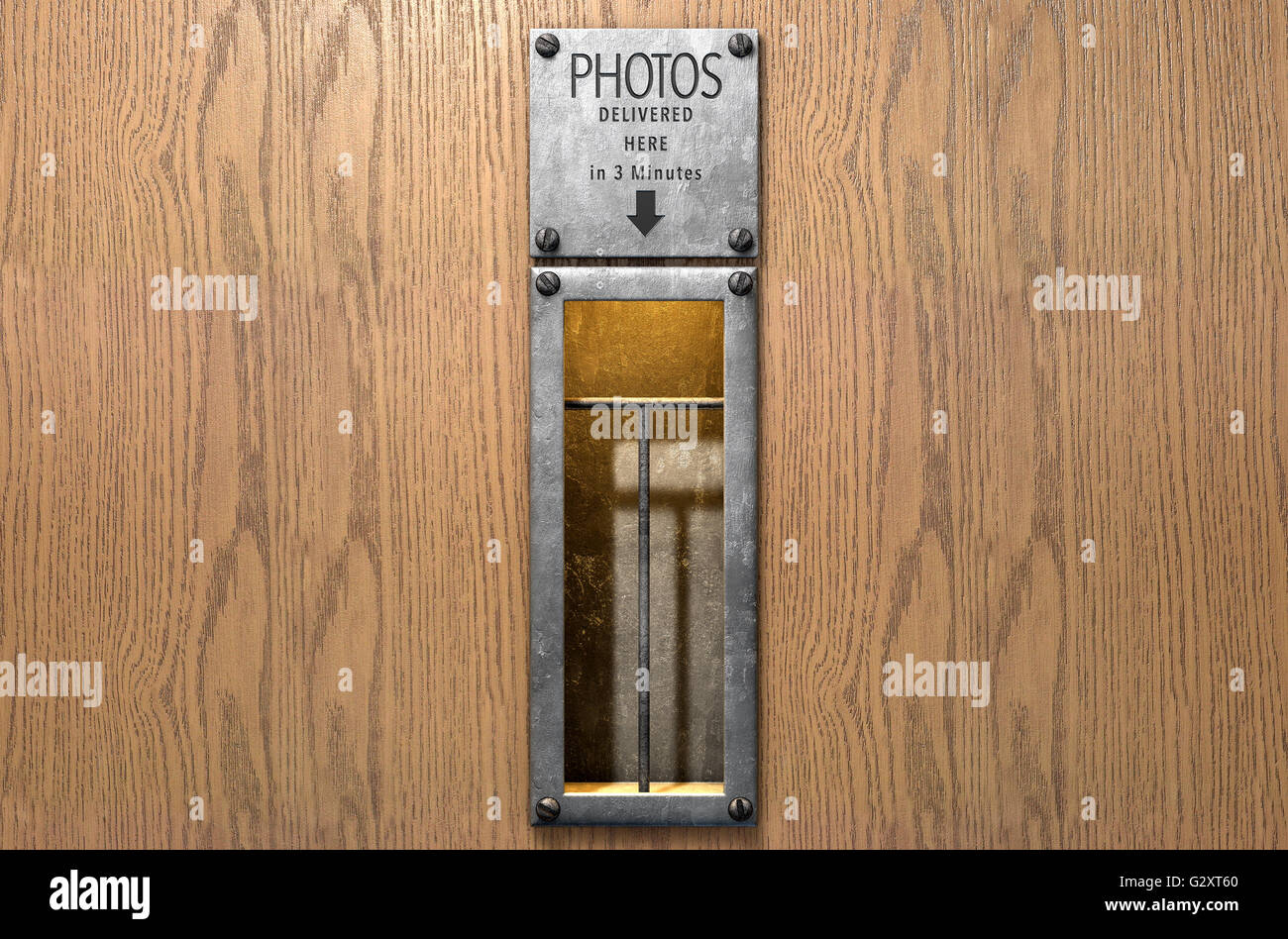 A 3D render of an empty illuminated vintage photo booths retrieval slot on a wood finished surface Stock Photo