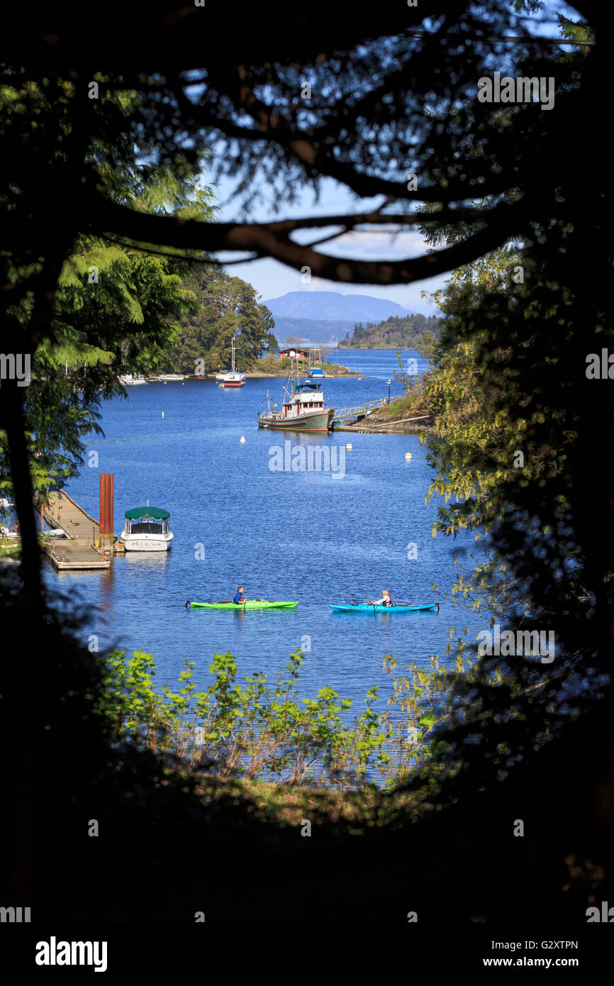 Tod Inlet, Brentwood Bay, Butchart Gardens, Victoria, British Columbia. A glimpse of the inlet from the gardens. Stock Photo