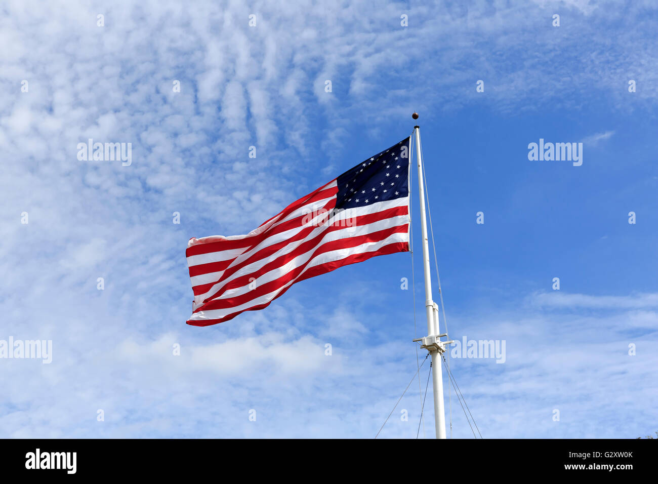 Historic version of the Stars and Stripes, with 13 stripes and 35 stars depicted in two circles. Stock Photo