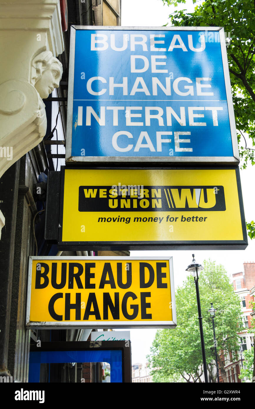 Bureau De Change and Western Union signs in London, UK Stock Photo - Alamy