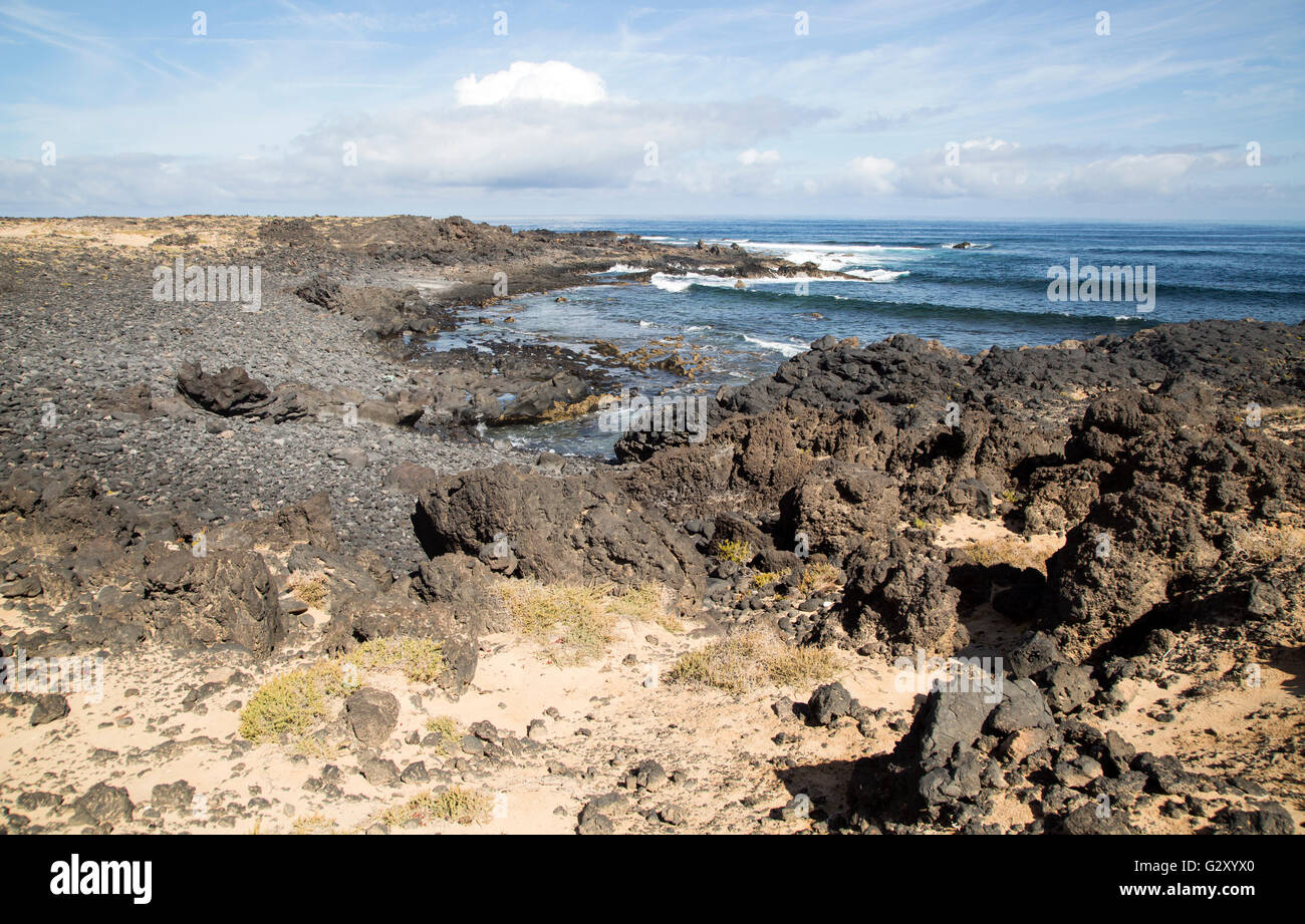 Small rocky cove at Caleta de Caballo, Lanzarote, Canary islands, Spain Stock Photo