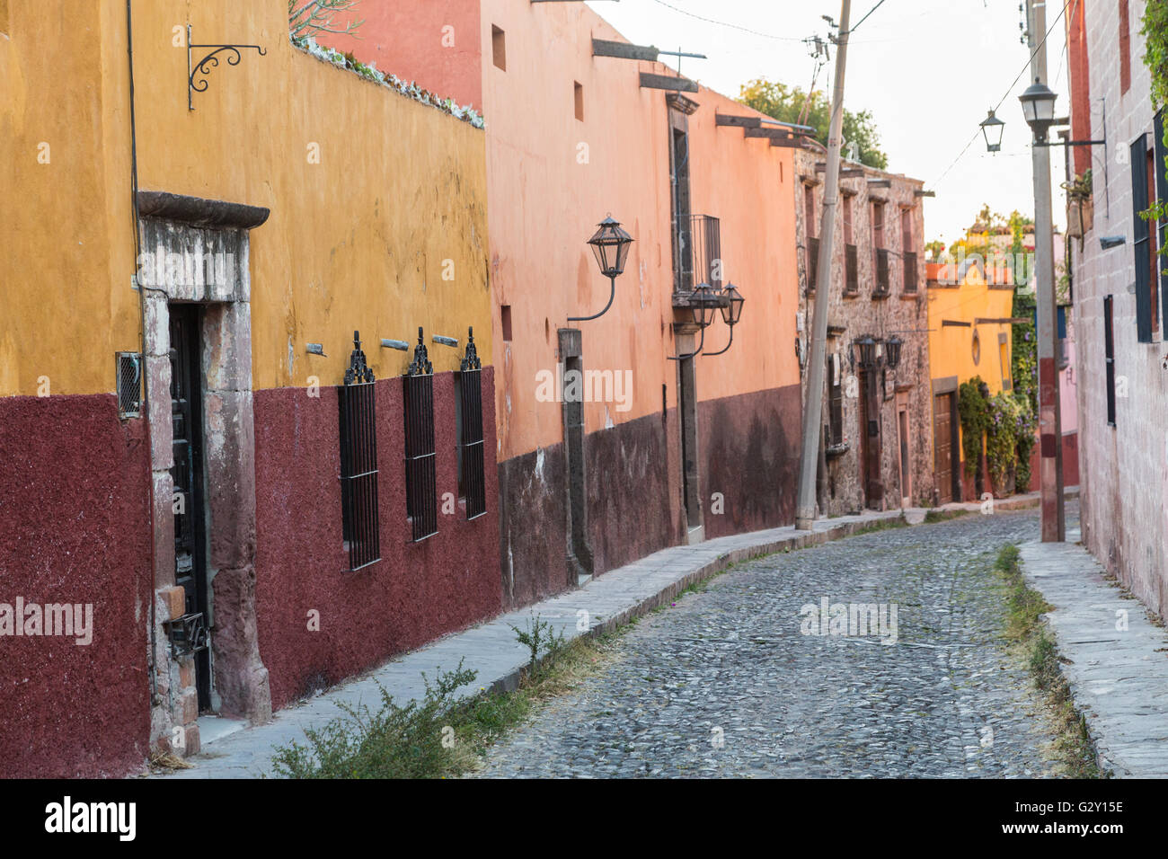 A cobblestone street and historic homes in San Miguel de Allende