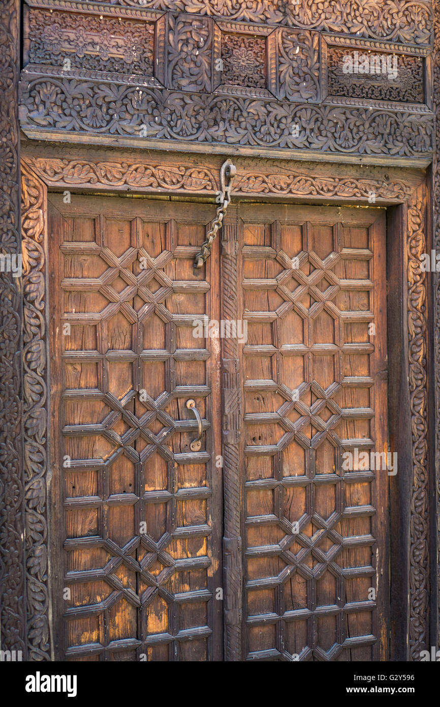 Ornate wooden doors Islamabad Punjab Pakistan Stock Photo