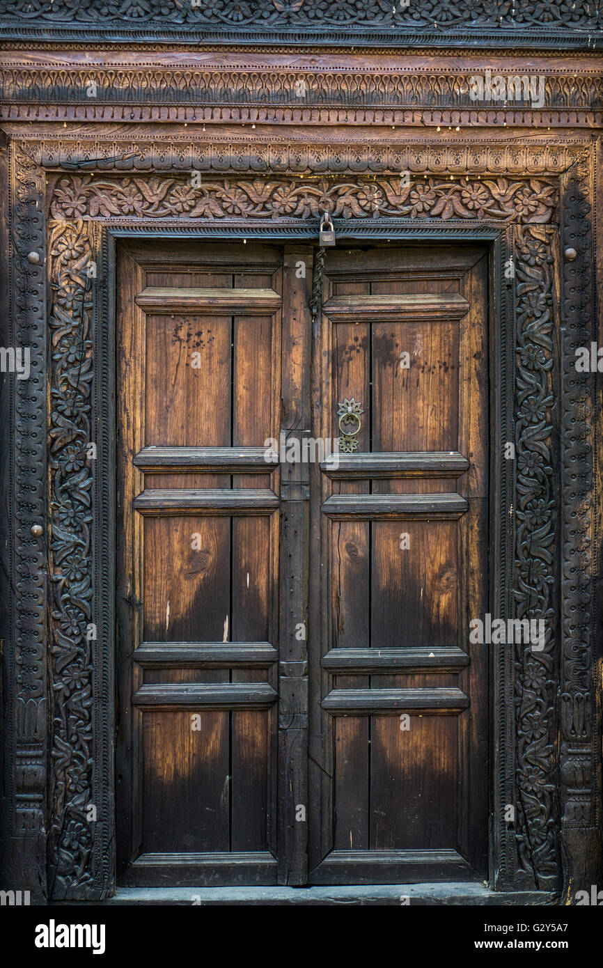 Ornate wooden doors Islamabad Punjab Pakistan Stock Photo