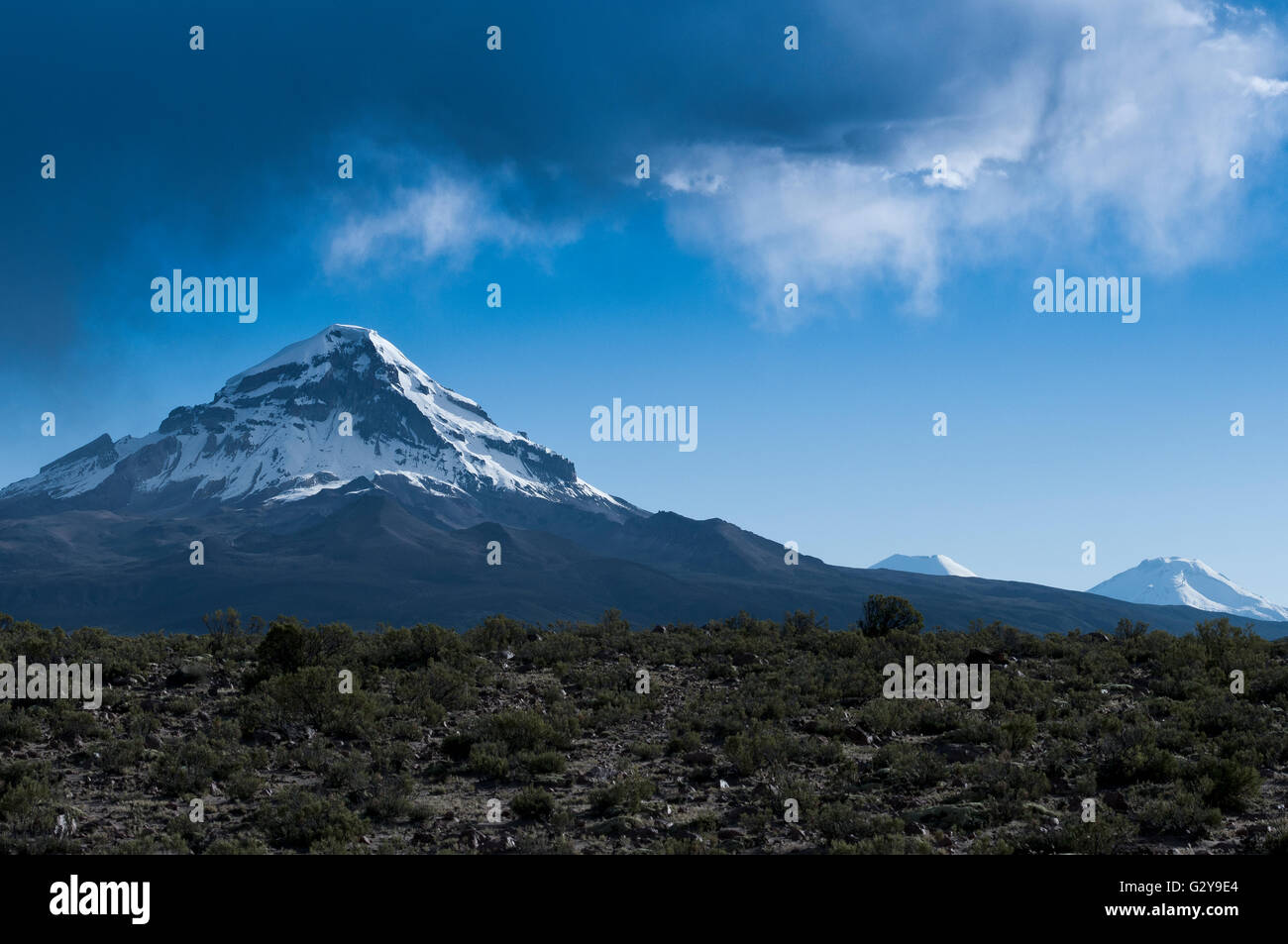 Sajama Volcano With Clouds Stock Photo