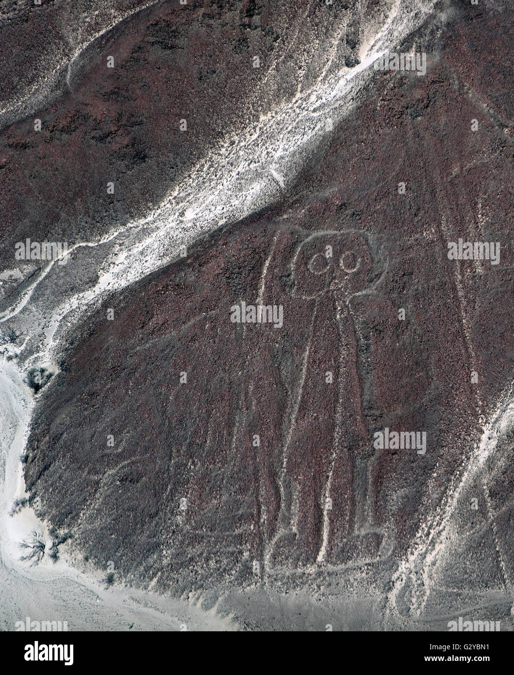 astronaut is visible from the Nazca desert. Because of the inclined position of the astronaut, it may have been subjected to mor Stock Photo