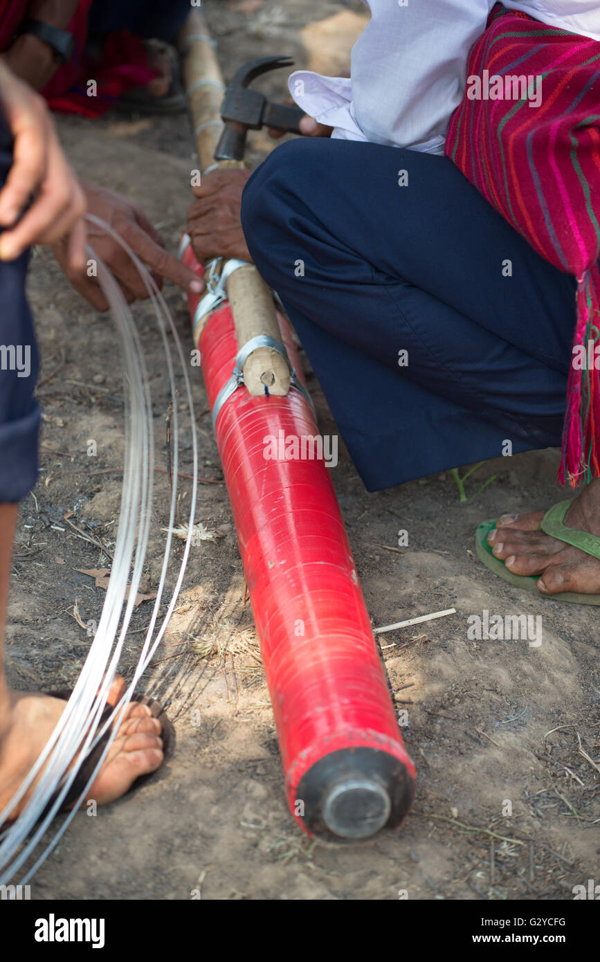 Preparing a bamboo rocket for the contest during Pa'O people National Day in Demoso, Kayah State, Myanmar Stock Photo