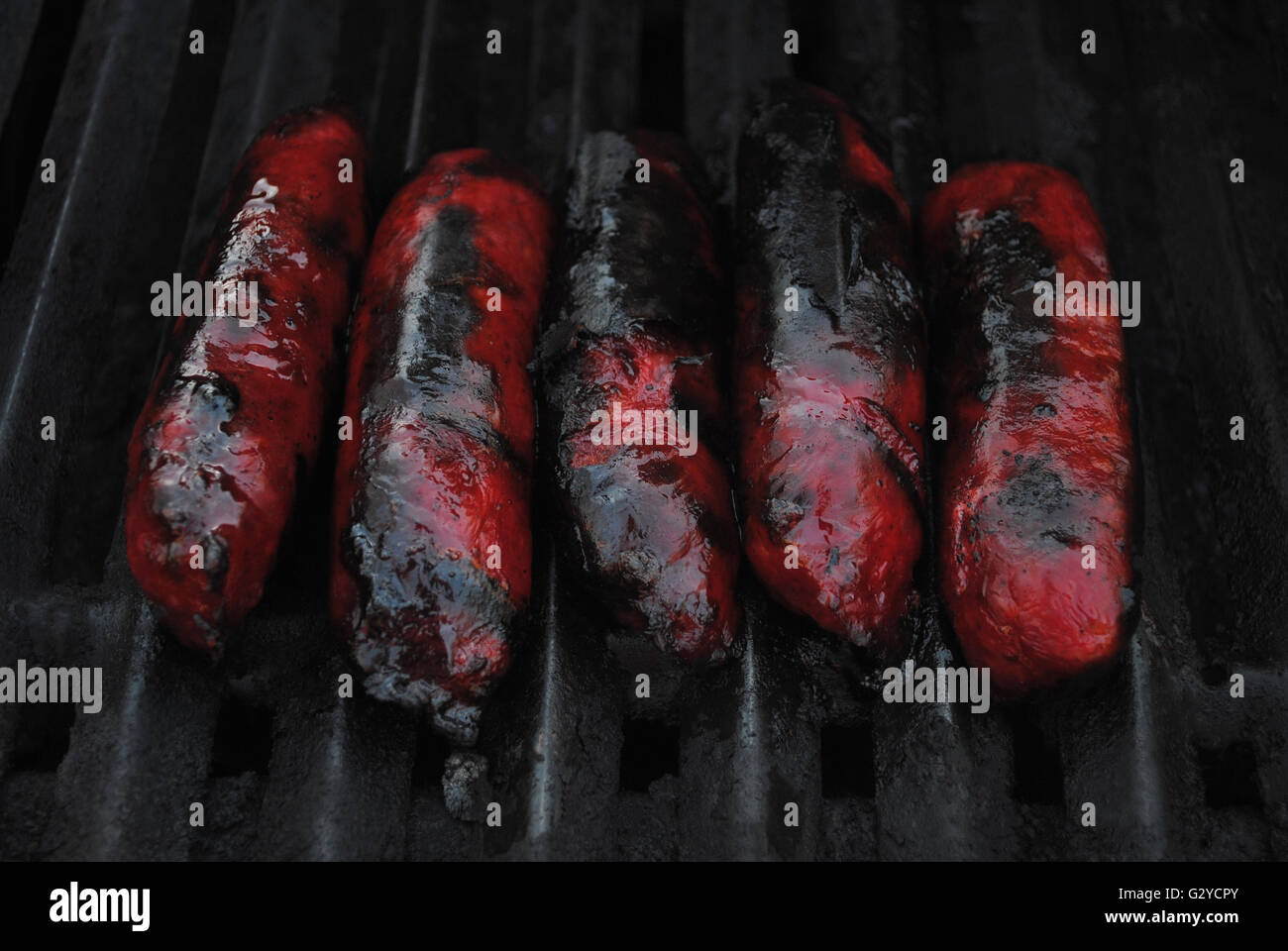 Chinese Sausage Cooking on a Summer Grill Stock Photo