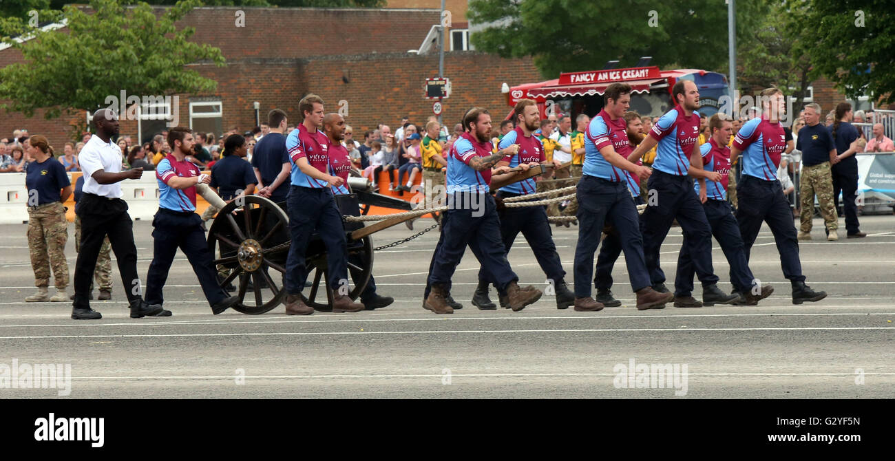 Fareham, Hampshire, UK. 4th June 2016. The most spectacular event took place at HMS Collingwood, Fareham, Hampshire when the establishment opened it gates for the annual Open Day, sponsored by 8 Wealth Management featuring the Royal Navy and Royal Marines Charity (RNRMC) Field Gun Competition.  The Field Gun competition featured crews from across the UK and as far afield as Gibraltar competing for the coveted Brickwoods Trophy. Credit:  uknip/Alamy Live News Stock Photo