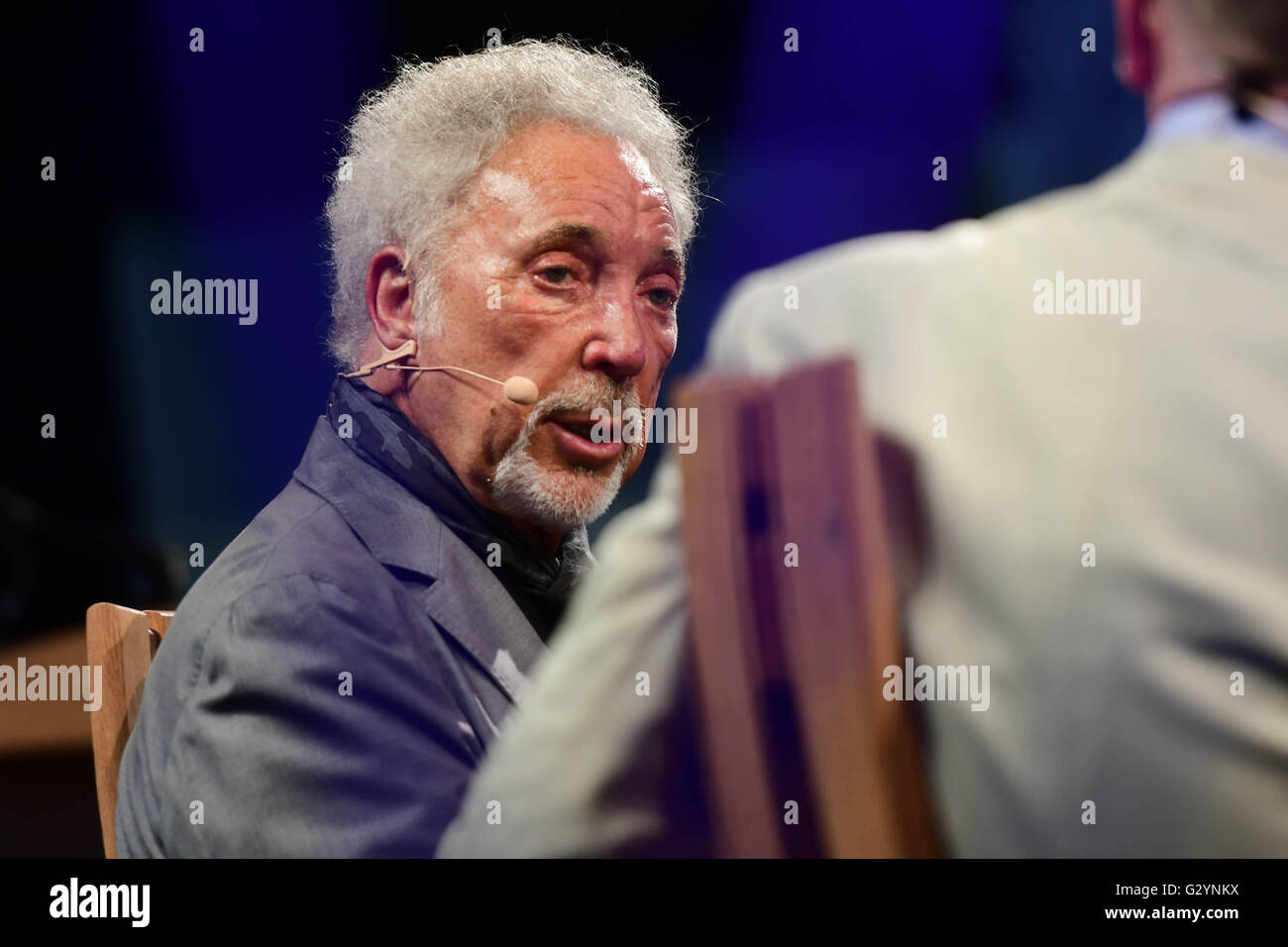 Hay Festival 2016, Hay on Wye, Powys , Wales UK  Sunday June 05 2016  Sir Tom Jones, speaking in public for the first time since the death of his wife, talking about his new autobiogrpahy on the final day of the 2016 Hay Festival of Literature and the Arts  For ten days in late May and early June  the small town of Hay on Wye on the  Wales-England border becomes the 'Woodstock of the Mind', and attracts some of the worlds best writers, novelists and poets   photo Credit:  Keith Morris / Alamy Live News Stock Photo