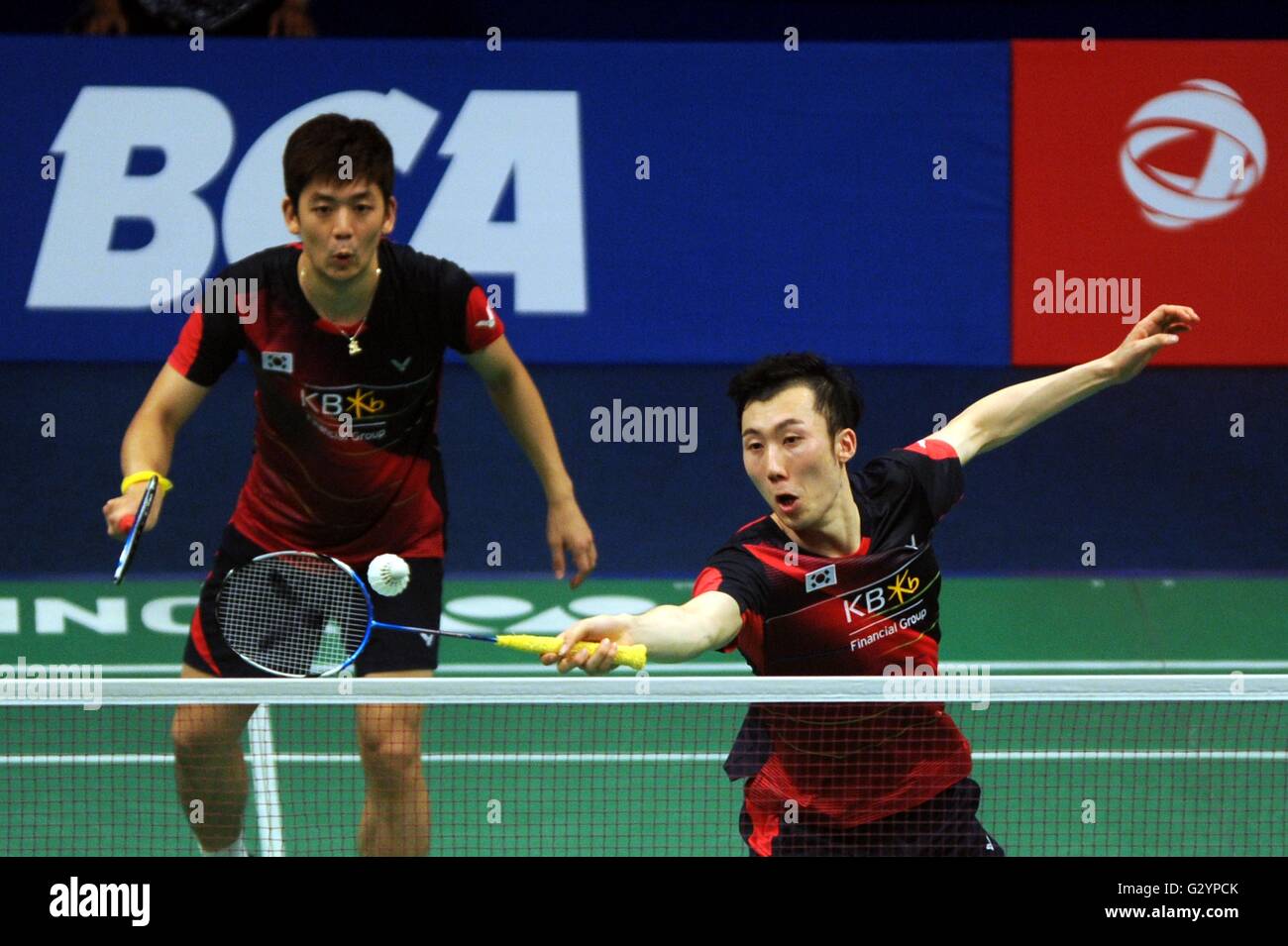 Jakarta, DKI Jakarta, Indonesia. 5th June, 2016. JAKARTA, INDONESIA - JUNE 05 : Lee Yong Dae/Yoo Yeon Seong of Korea hits a return against Chai Biao/Hong Wei of China during men's double in the Indonesia Open 2016 in Jakarta, Indonesia on June 05, 2016. Lee Yong Dae/Yoo Yeon Seong of Korea win Indonesia Badminton Open with score 13-21, 21-13 and 21-16. © Sijori Images/ZUMA Wire/Alamy Live News Stock Photo