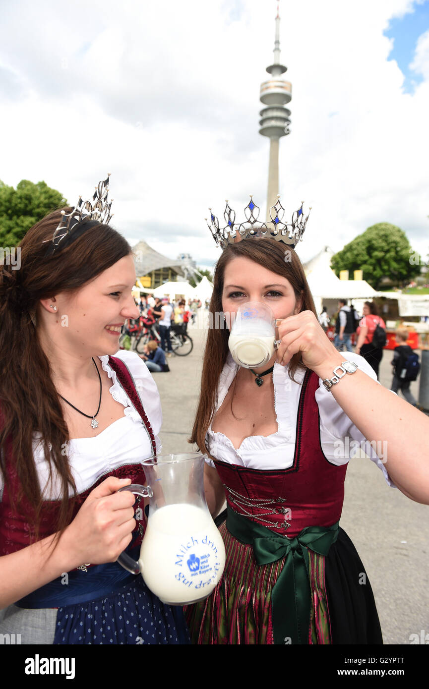 Munich, Germany. 05th June, 2016. Milk Queen Susanne Polz (R) drinks ...