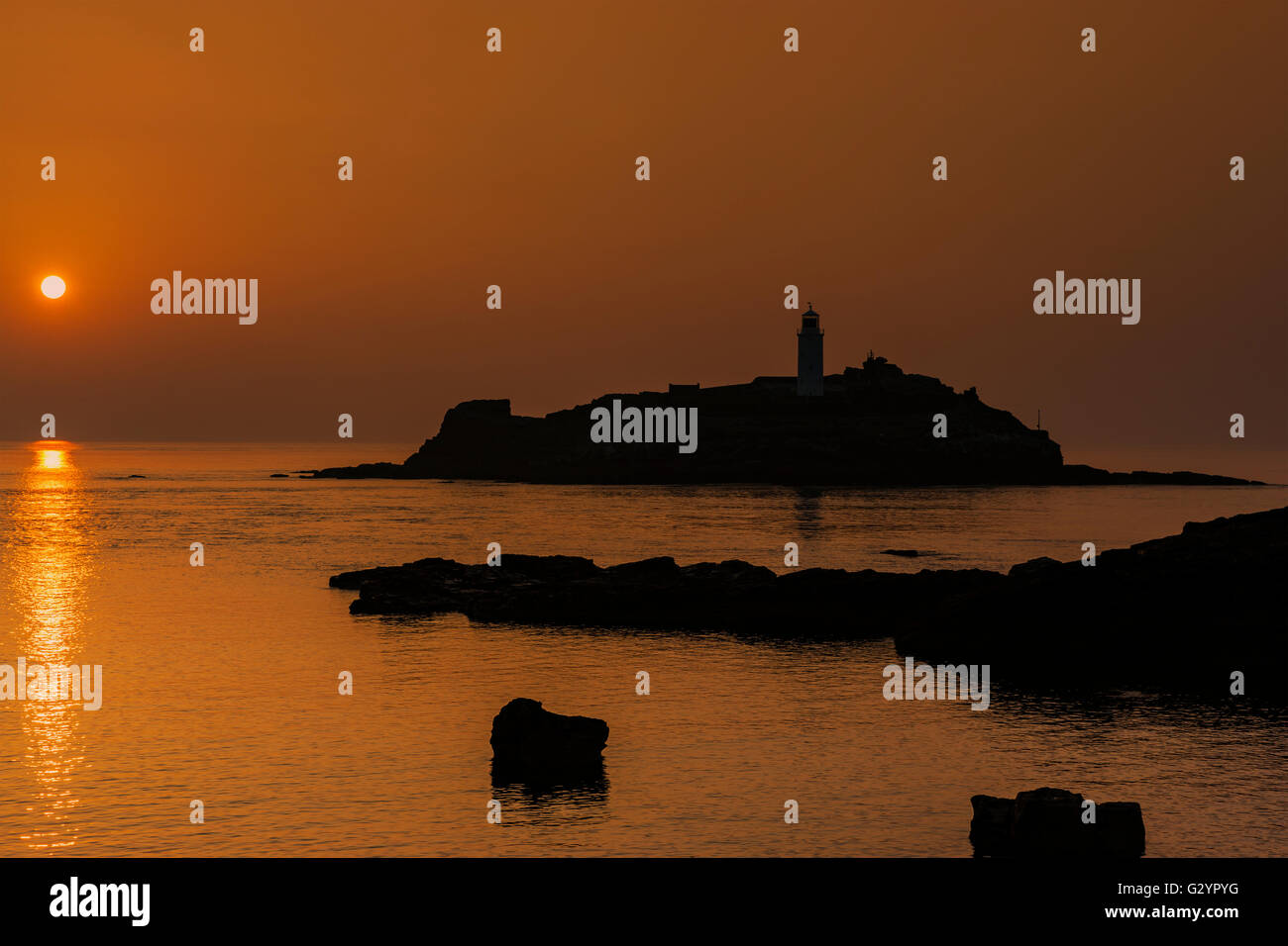 Sunset Over Godrevy Lighthouse, Cornwall, England, 4th, June, 2016. © Barry Bateman / Alamy News Stock Photo