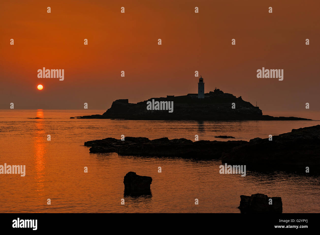 Sunset Over Godrevy Lighthouse, Cornwall, England, 4th, June, 2016. © Barry Bateman / Alamy News Stock Photo