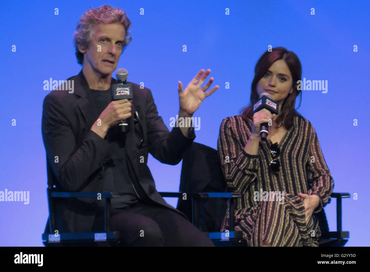 Washington, DC, USA. 5th June, 2016. Doctor Who's Peter Capaldi (the Twelfth Doctor) answering a question as Jenna-Louise Coleman (Clara Oswald) listens at Awesome Con 2016, held in Washington, DC. Credit:  Evan Golub/ZUMA Wire/Alamy Live News Stock Photo