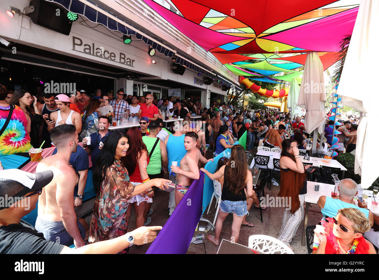 View of sidewalk in front of the famed drag show venue Palace Bar on Ocean Dr. during Miami Beach Gay Pride. Stock Photo