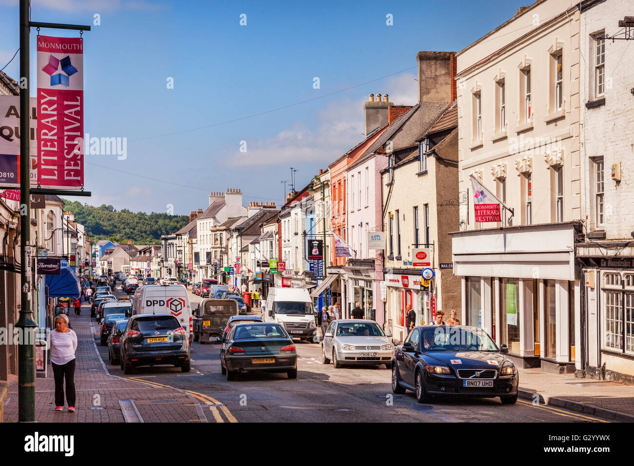Monnow Street, the main shopping street in Monmouth, with a banner advertising the Literary Festival,  Monmouthshire, Wales, UK Stock Photo