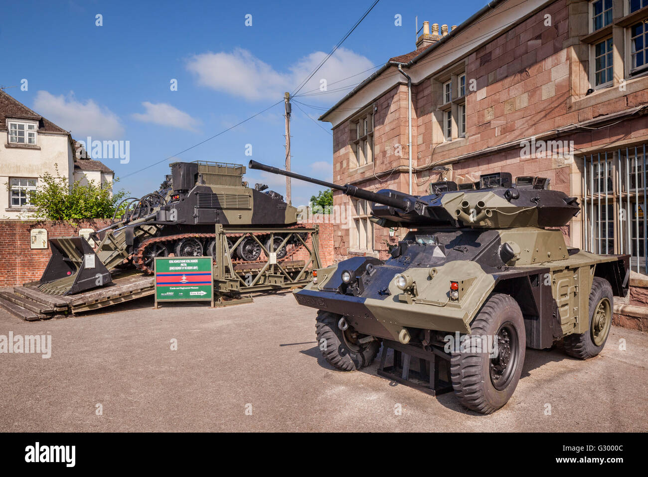 A FV721 Fox armoured car and a FV180 Combat Engineer Tractor outside the Headquarters and Museum of the Royal Monmouthshire... Stock Photo