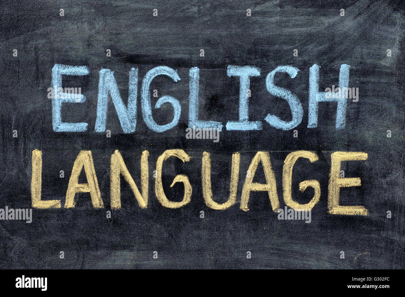 English language. English Language on blackboard. Close up. Stock Photo