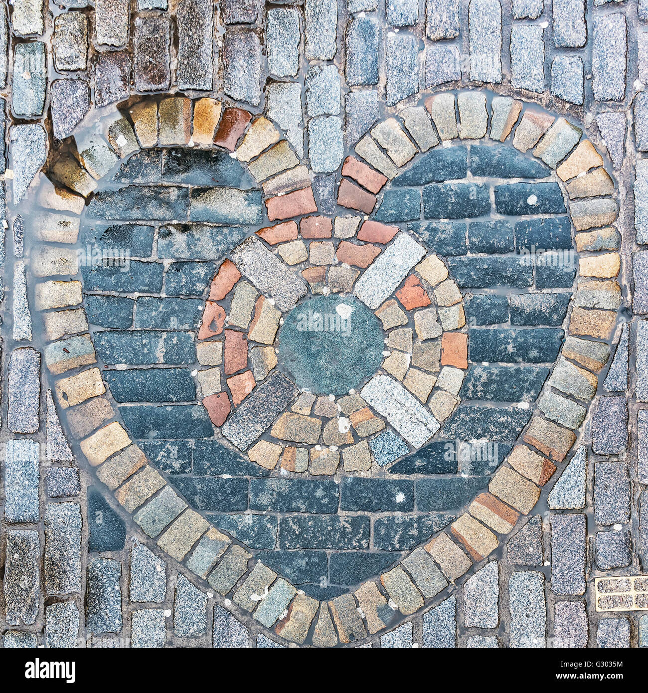 The Heart of Midlothian, built into the cobblestones of Edinburgh's Royal Mile in the nineteenth century. It is considered good Stock Photo