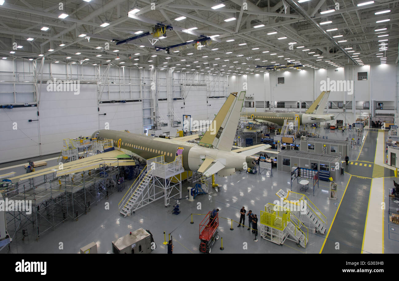 A Bombardier C Series jet is shown on the assembly line at a Bombardier assembly plant in Mirabel, Que., Canada, Friday, April 2 Stock Photo