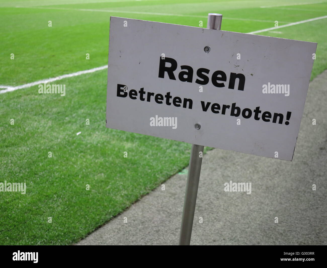 Sign, Rasen betreten verboten!, German for Keep off the grass! Stock Photo