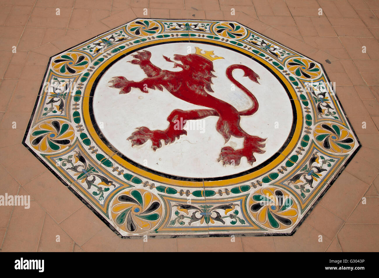 Ceramic figure of a lion on the floor in the Plaza de Espana, Seville, Andalusia, Spain, Europe Stock Photo