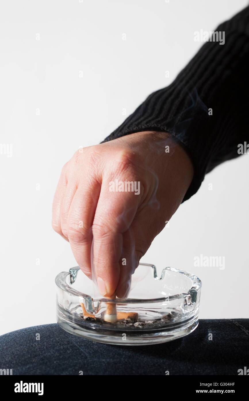cigarette extinguisher ashtray Extinguishing cigarette hi-res stock photography and images