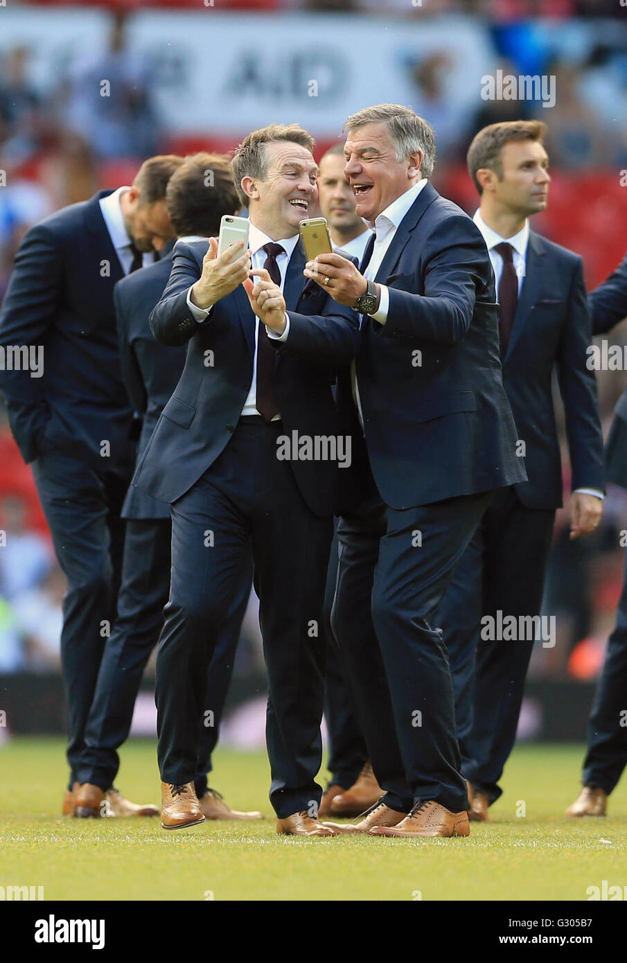 England coaches Bradley Walsh (left) and Sam Allardyce pose for a photo ...