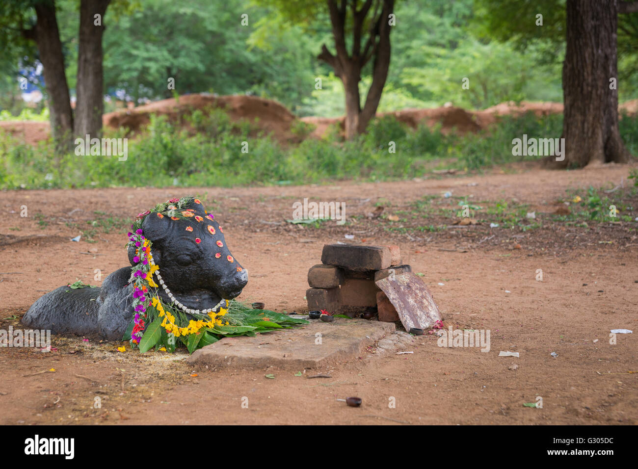 Nandi at Shiva shrine in forest near Kothamangalam. Stock Photo