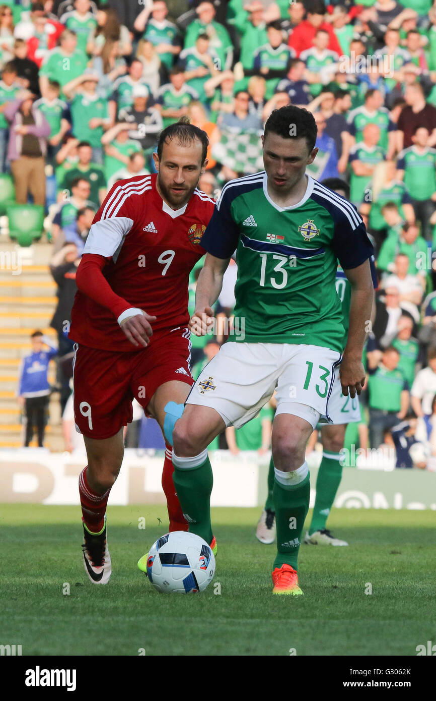 27th May 2016 - Vauxhall International Challenge (Friendly). Northern Ireland 3 Belarus 0. Northern Ireland's Corry Evans (13) and Belarus' Ihar Stasevich challenge for the ball. Stock Photo