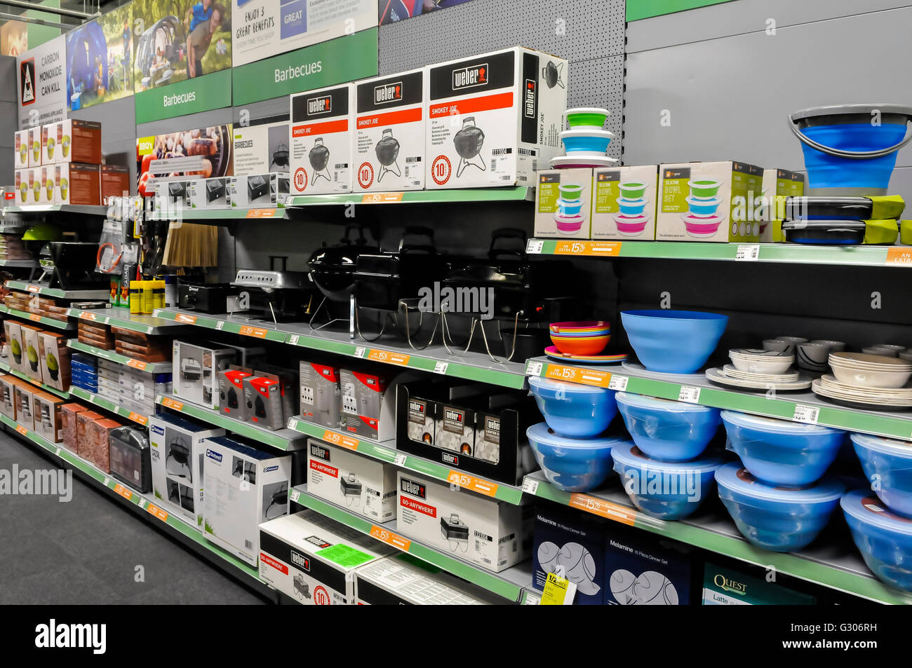 Barbeques and accessories on sale in the camping section of Go Outdoors sports shop. Stock Photo