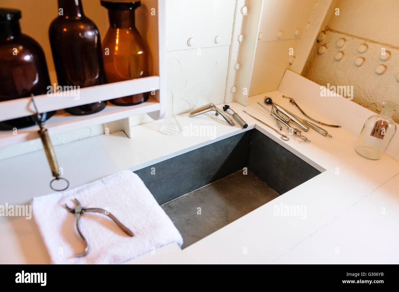 Surgical tools beside a sink after washing within a doctor's surgery from WW1. Stock Photo