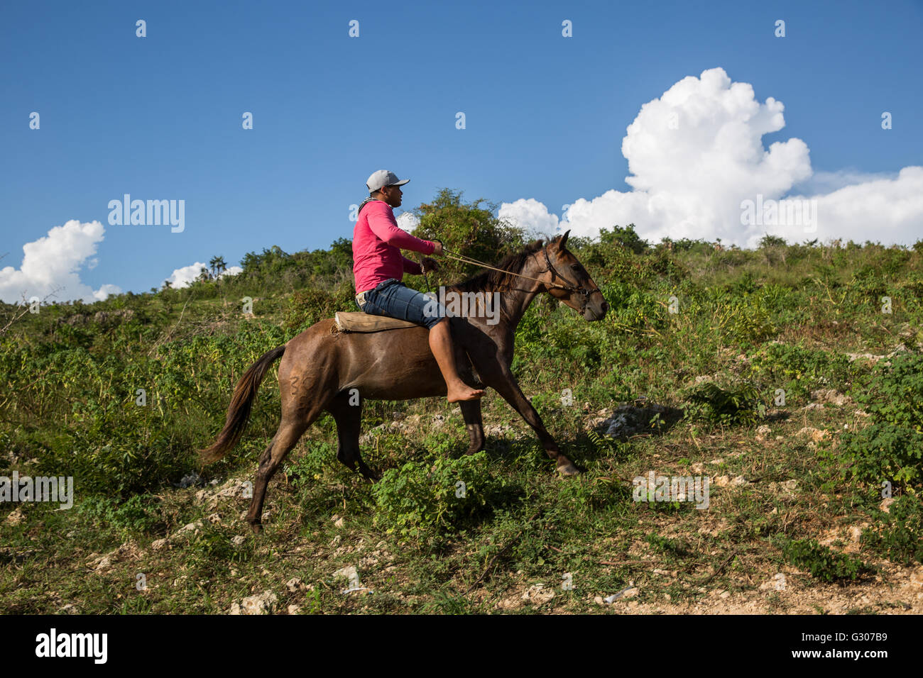 Man riding horse without saddle in Trinidad, Cuba Stock Photo