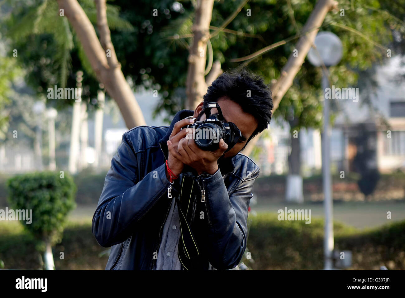Young boy dslr camera hires stock photography and images Alamy