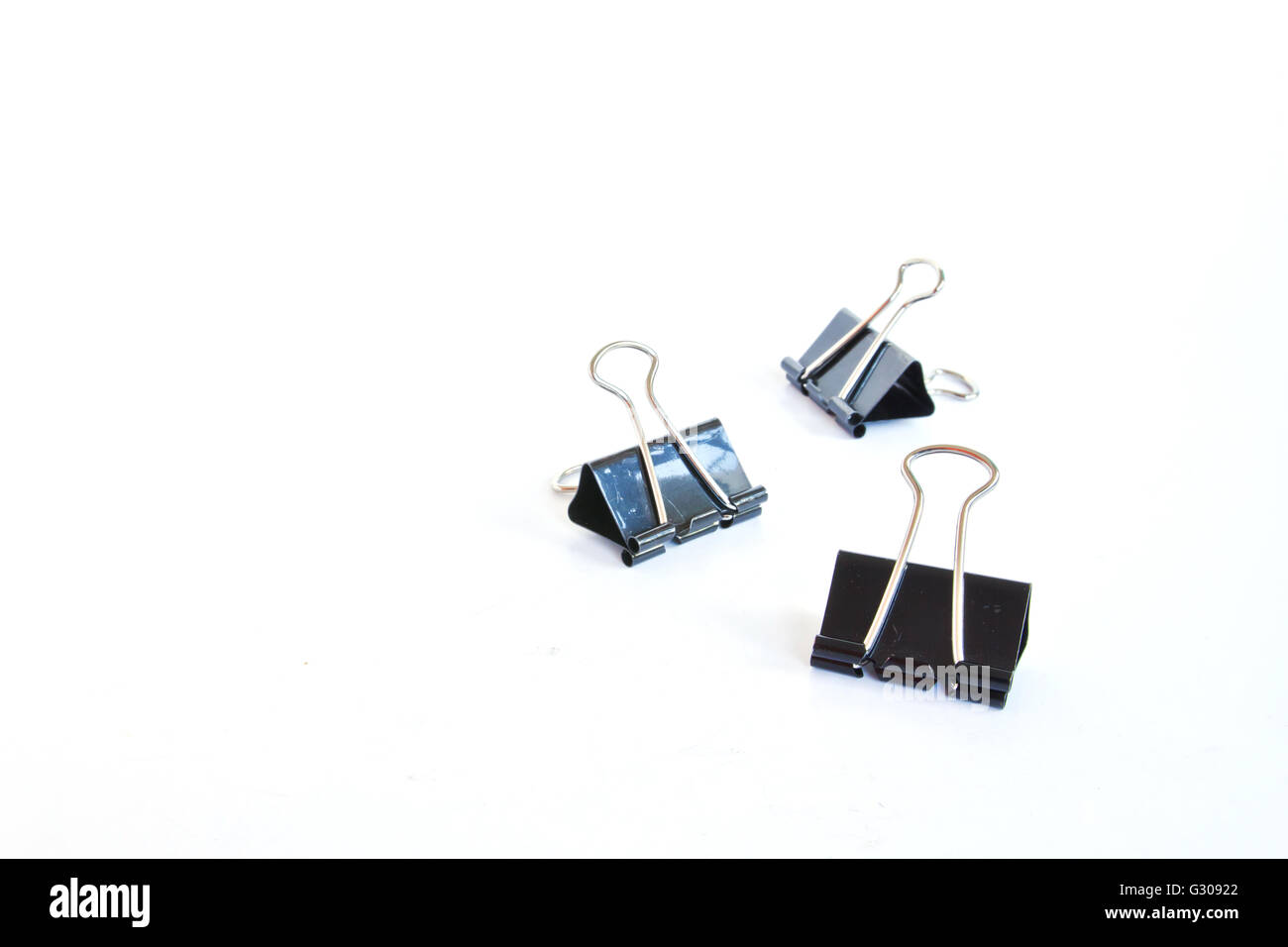 Binder clips for paper on a white background Stock Photo Alamy