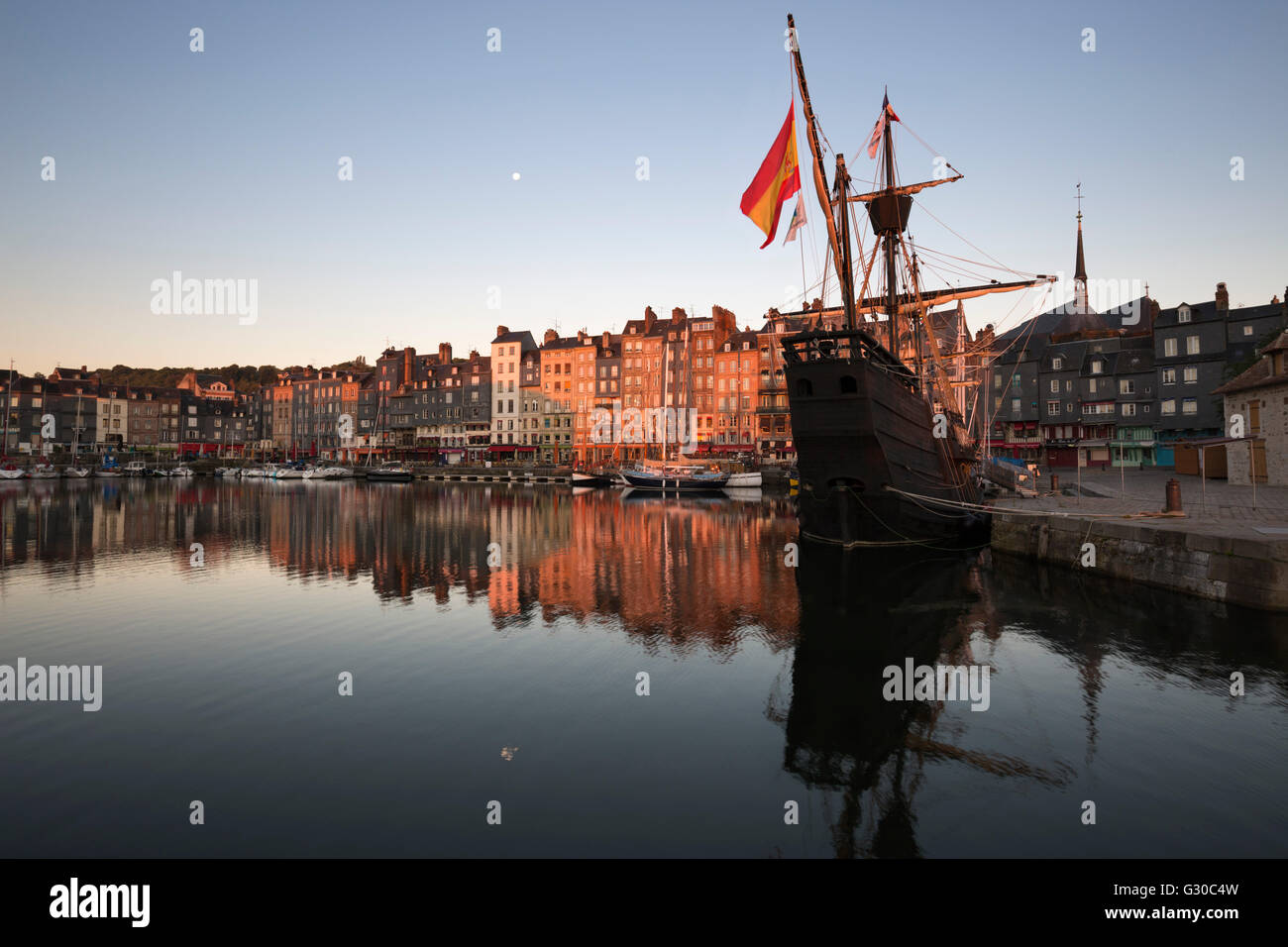 Vieux Bassin looking to Saint Catherine Quay with replica galleon at dawn, Honfleur, Normandy, France, Europe Stock Photo