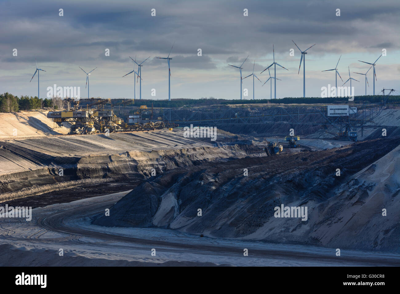 Surface lignite mining Cottbus - Nord company Vattenfall with carriers and windmills, Germany, Brandenburg , Peitz Stock Photo
