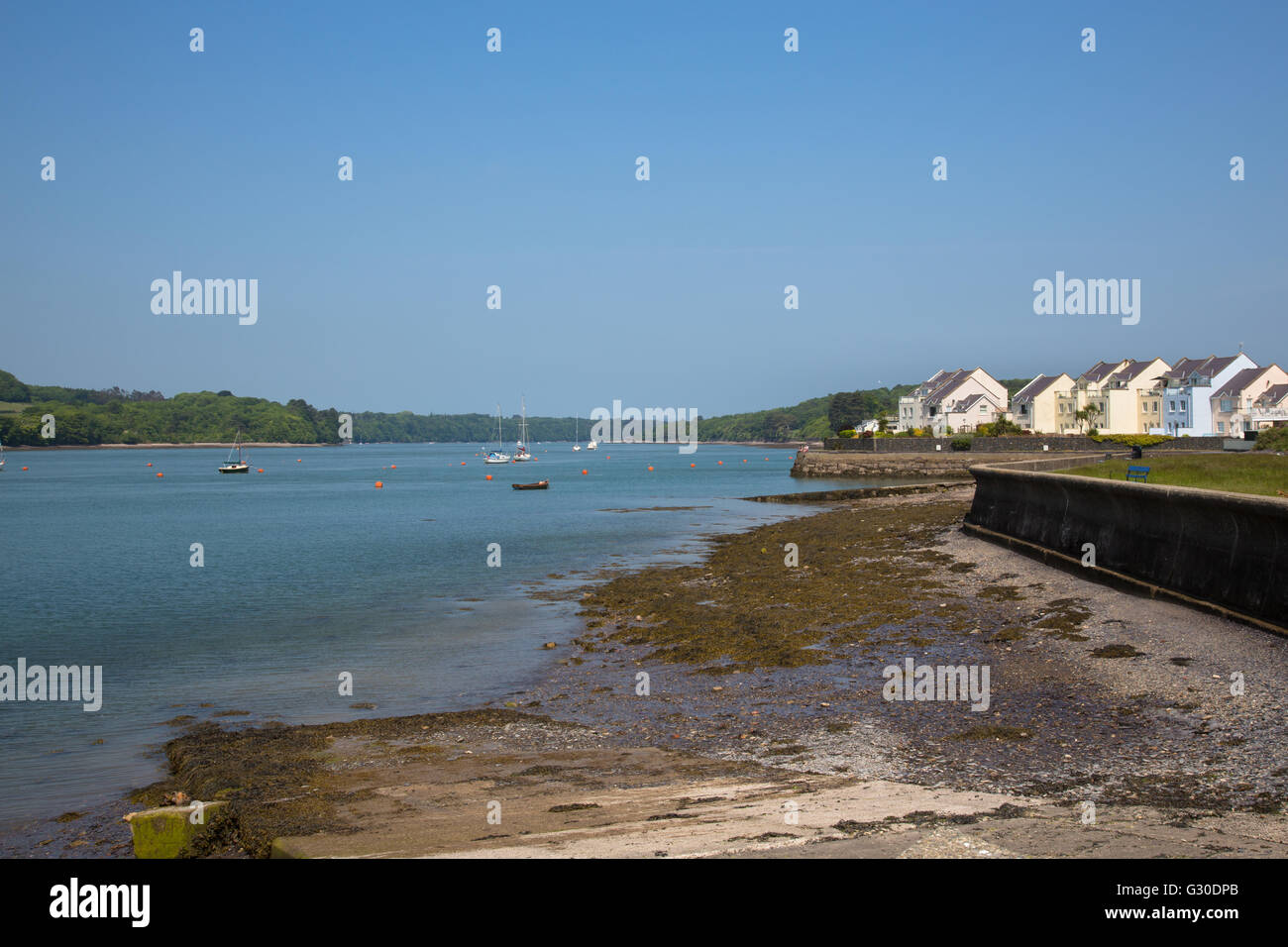Modern pastel housing estate on the banks of the Menai Strait at y
