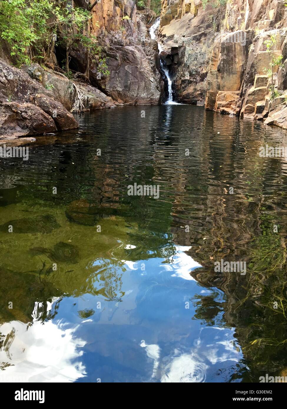 A waterfall at a billabong called Moline Rockhole, located just outside of Kakadu National Park, Australia Stock Photo