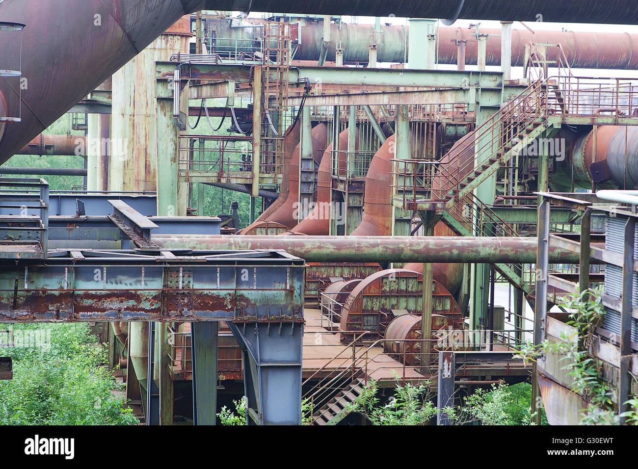 Nature takes over old boiler house. Stock Photo