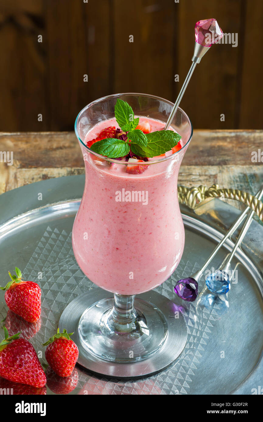 Fresh strawberry daiquiri cocktail with ice cream and rum Stock Photo