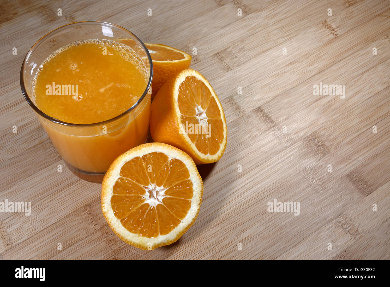 orange juice whit orange on the table Stock Photo